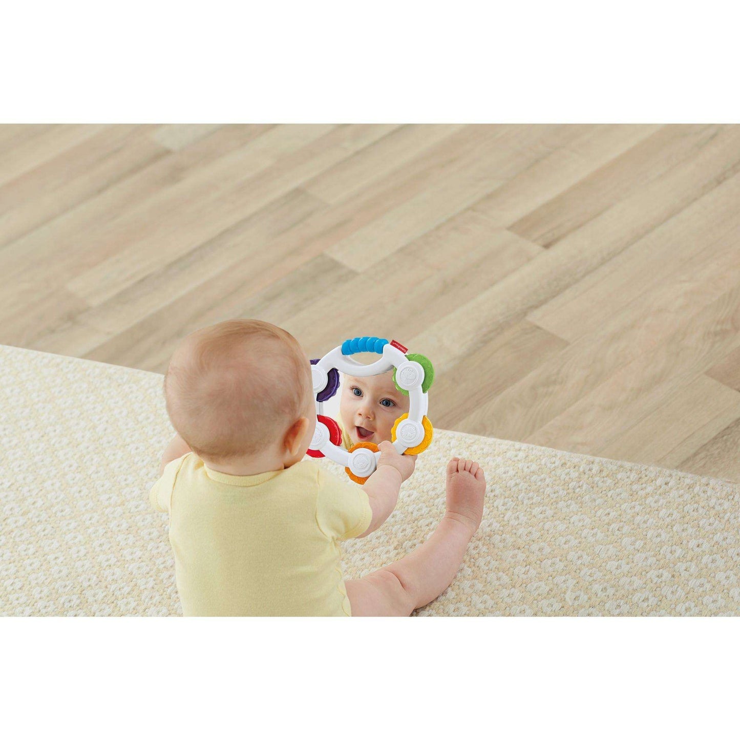 Fisher-Price Shake 'n Beats Tambourine Rattle With Bright colors, clacker sounds and a large, shiny mirror
